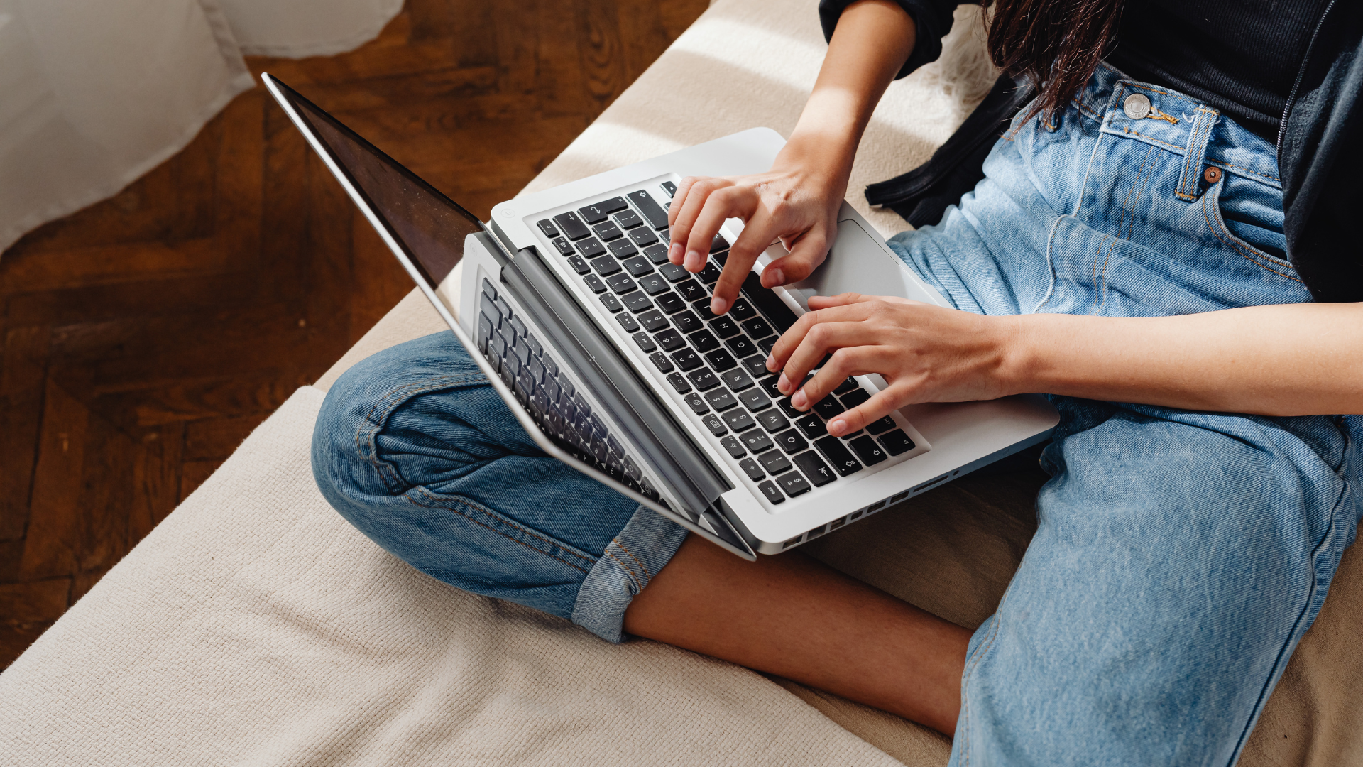 
Gemini said
A person sits on a neutral-toned couch using a laptop to access the Aisle Planner Pro wedding business platform, showcasing the software's portability for event professionals working remotely.