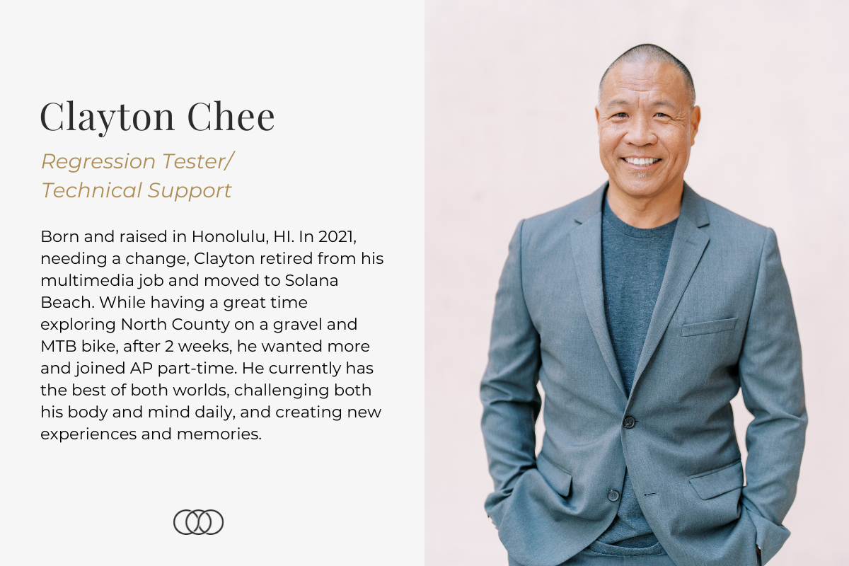 Clayton in a gray suit