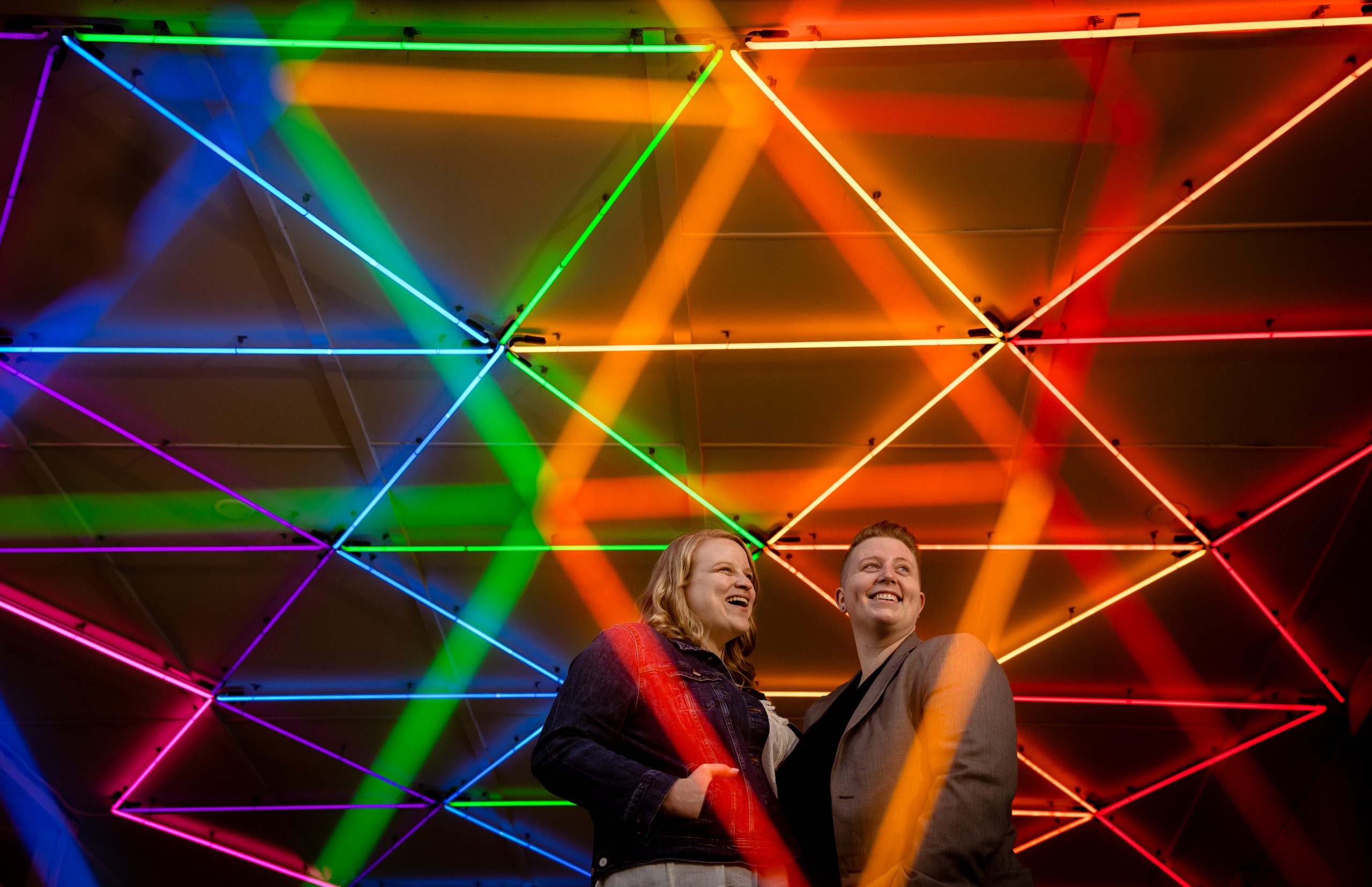 Bright lights and LGBTQ couple