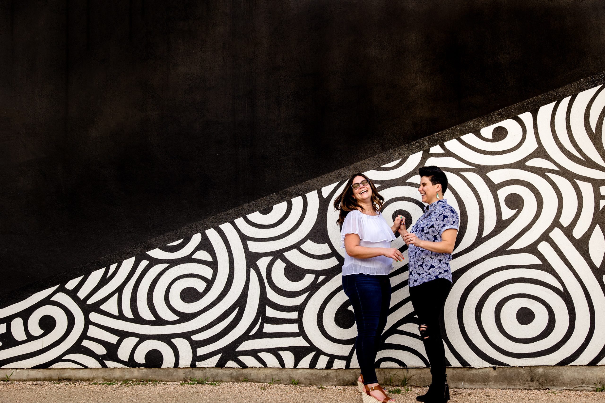Black and white wall and LGBT couple
