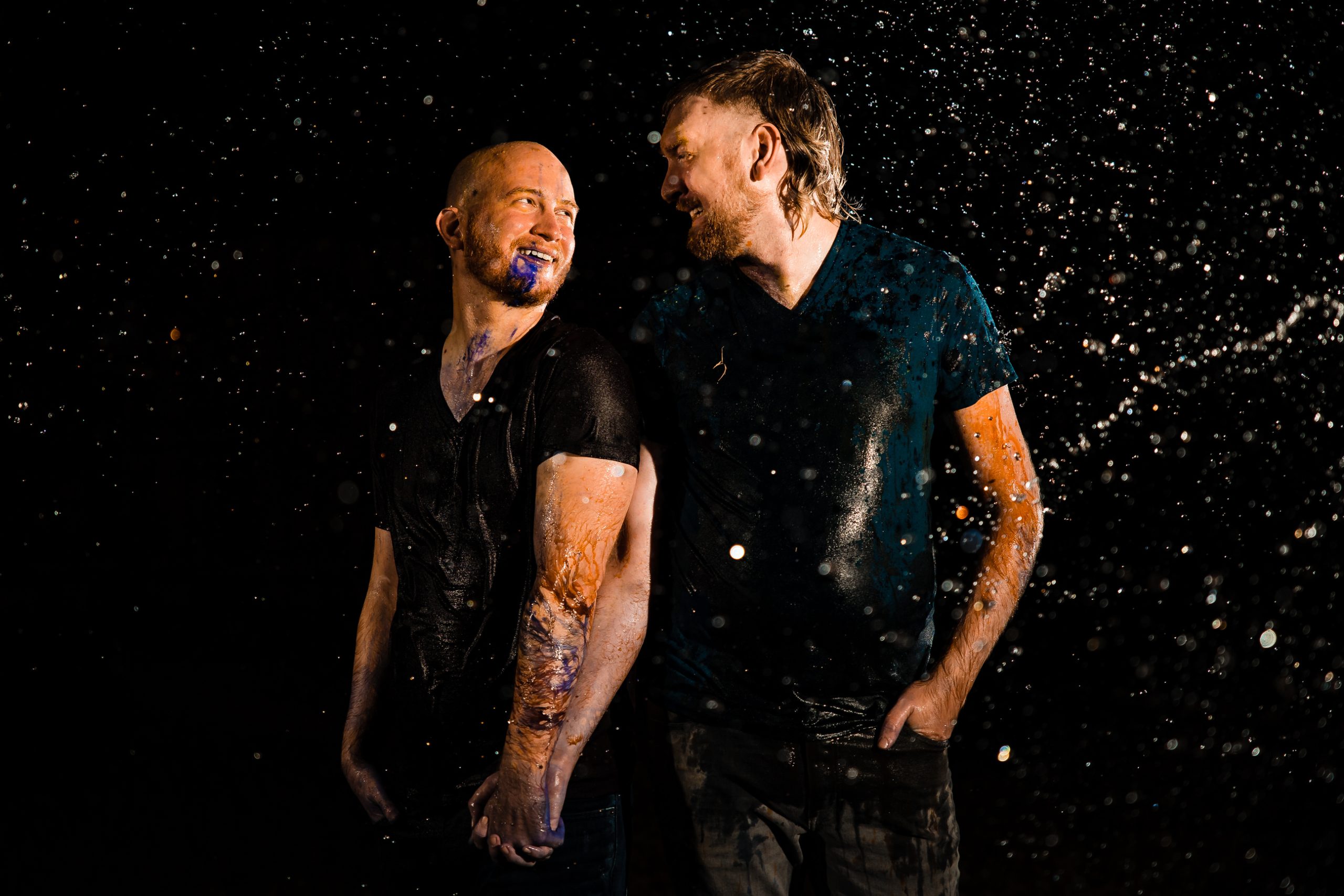 LGBTQ couple holding hands