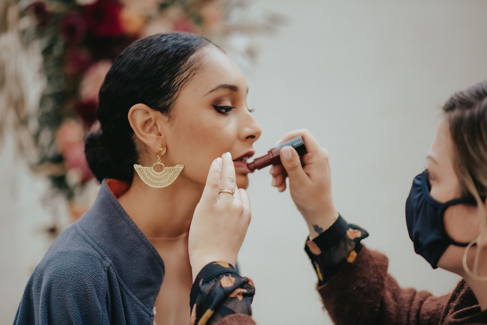 Bride having makeup done
