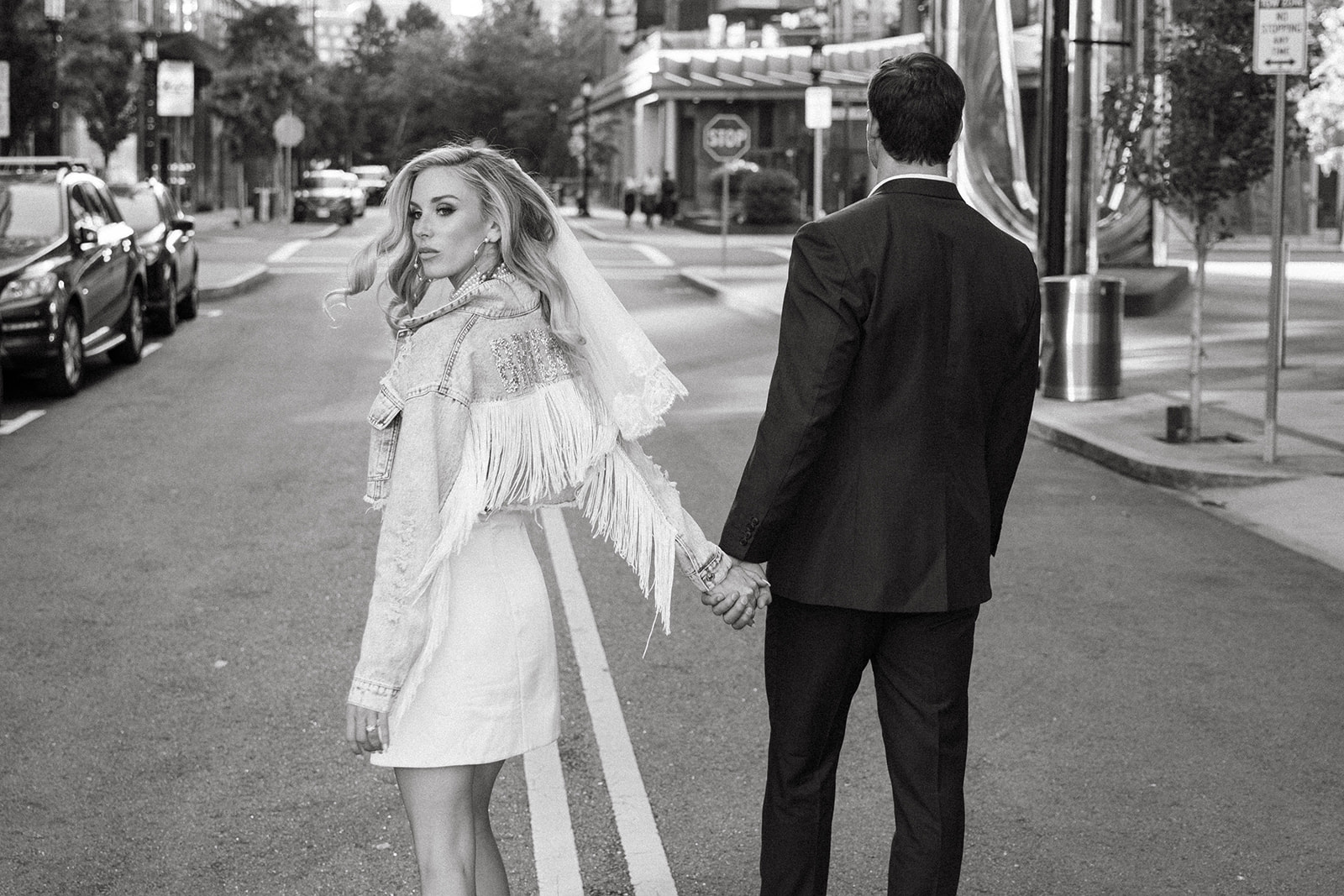 Married couple in the middle of the street walking