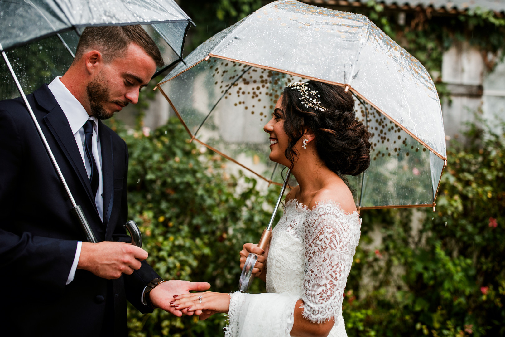Couple getting married in the rain