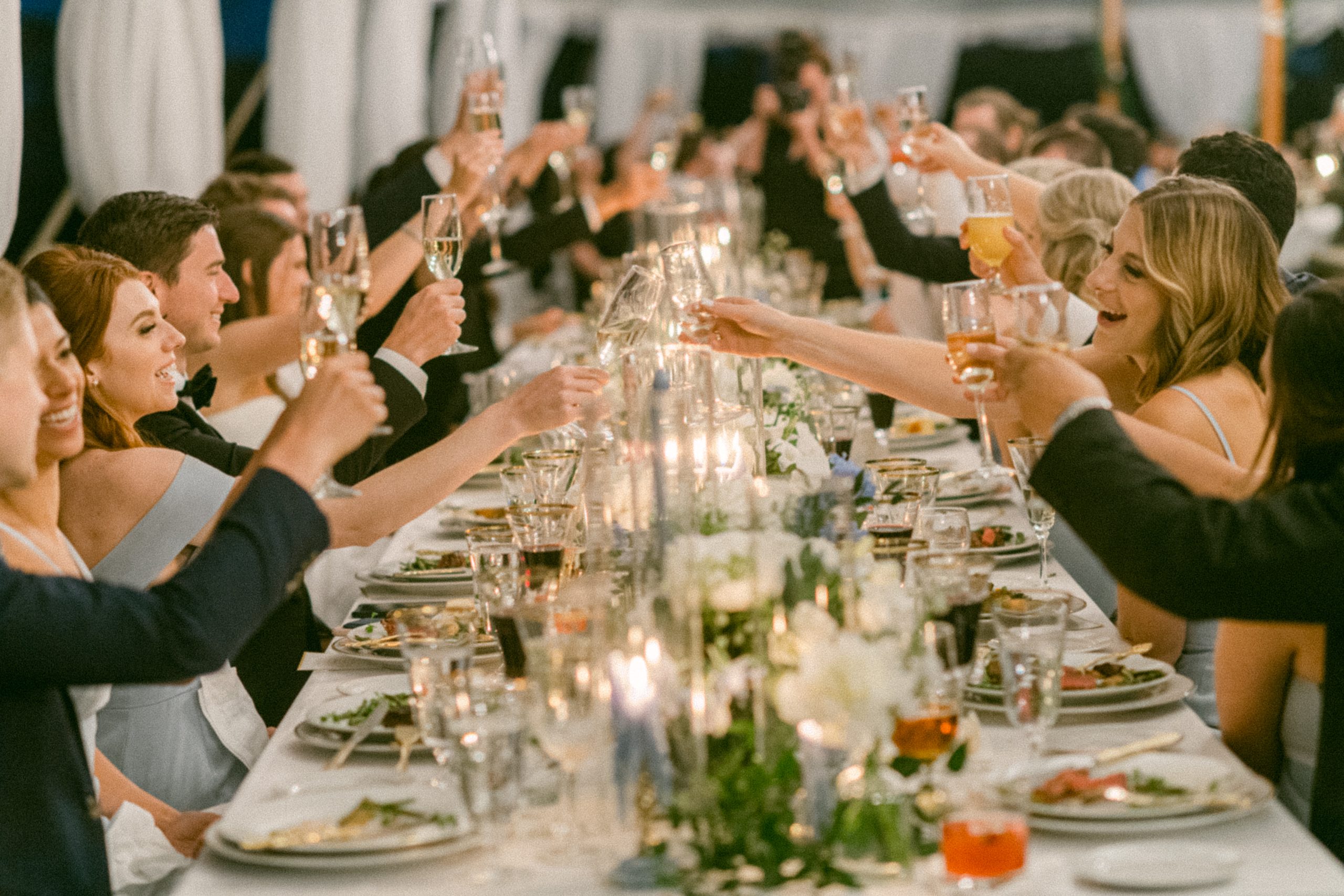 Table with guests toasting