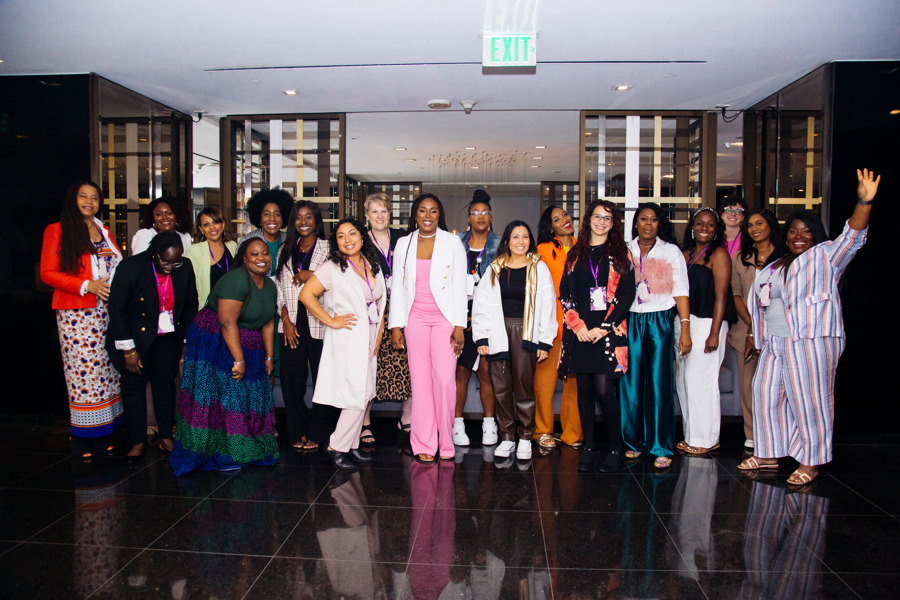 Event conference attendees smiling together