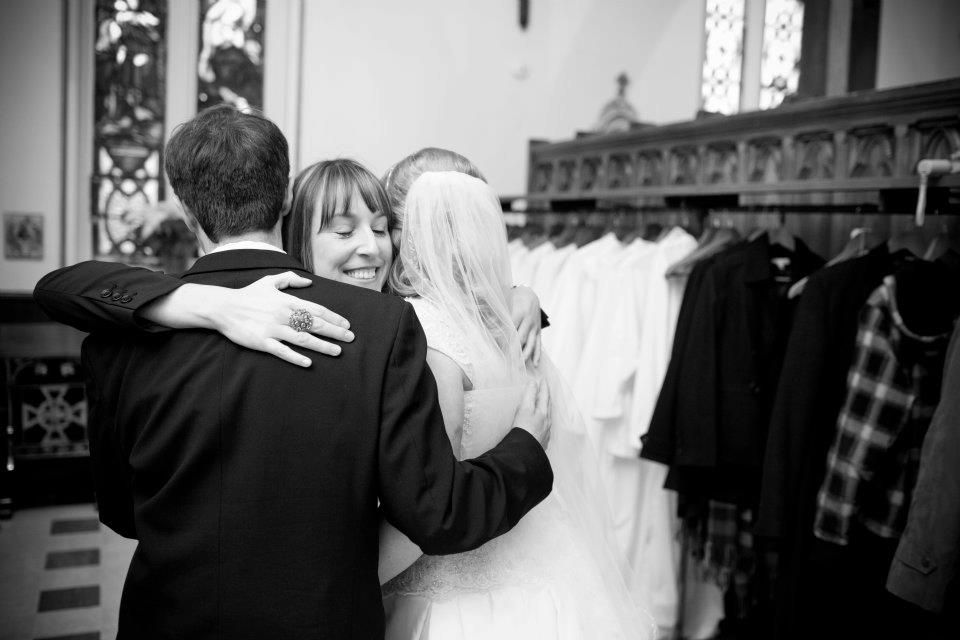 Shannon hugging couple