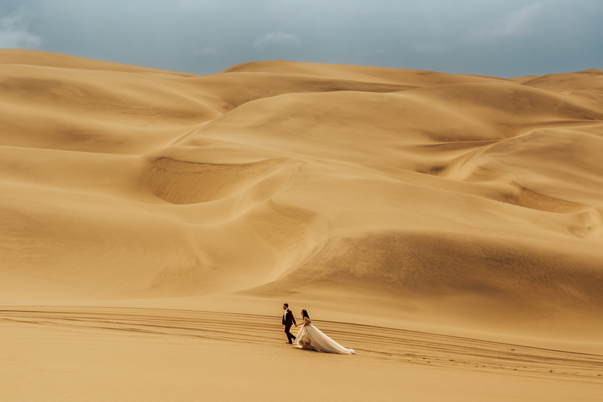 Couple in sand dunes