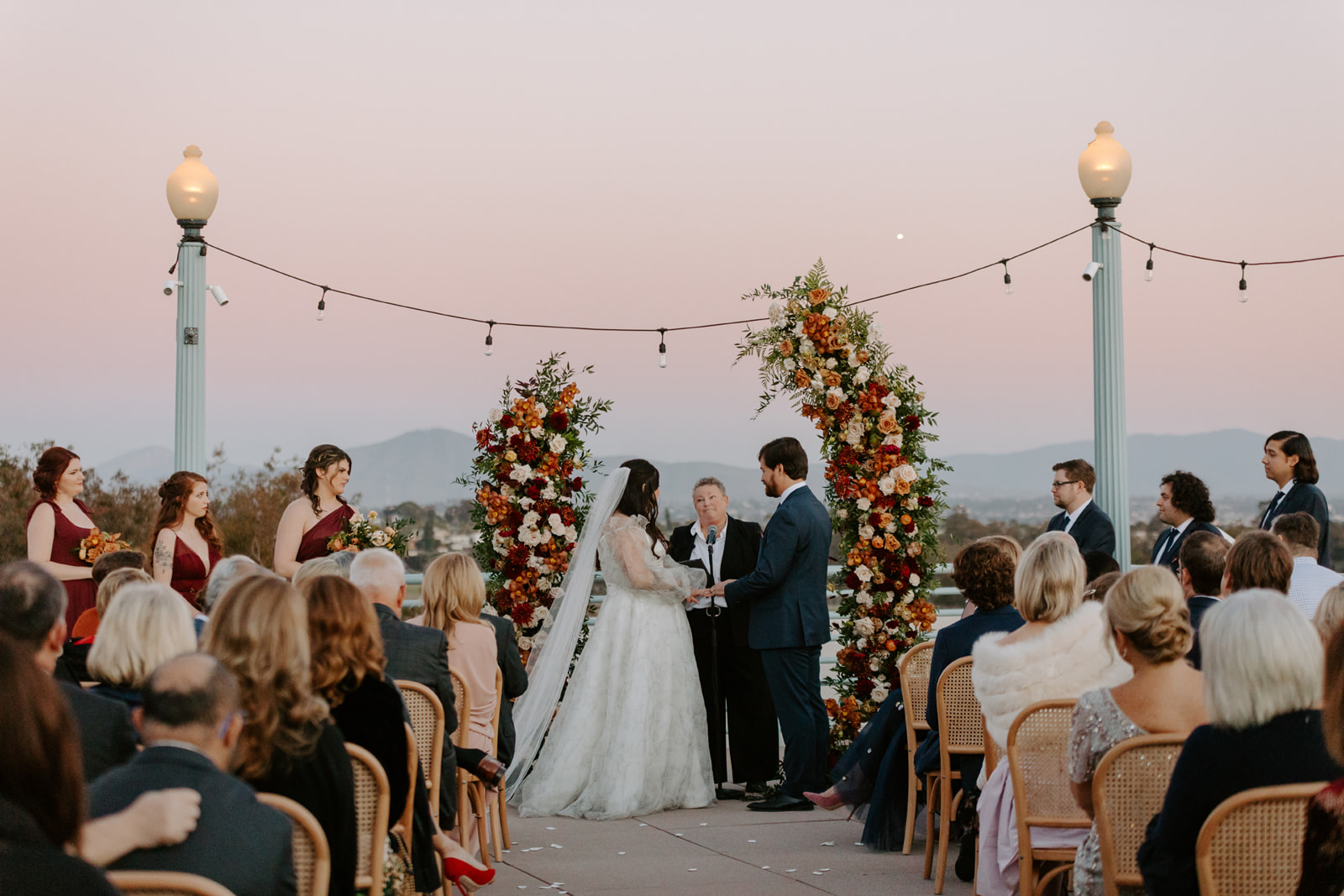 Amaya and Peter at the alter getting married