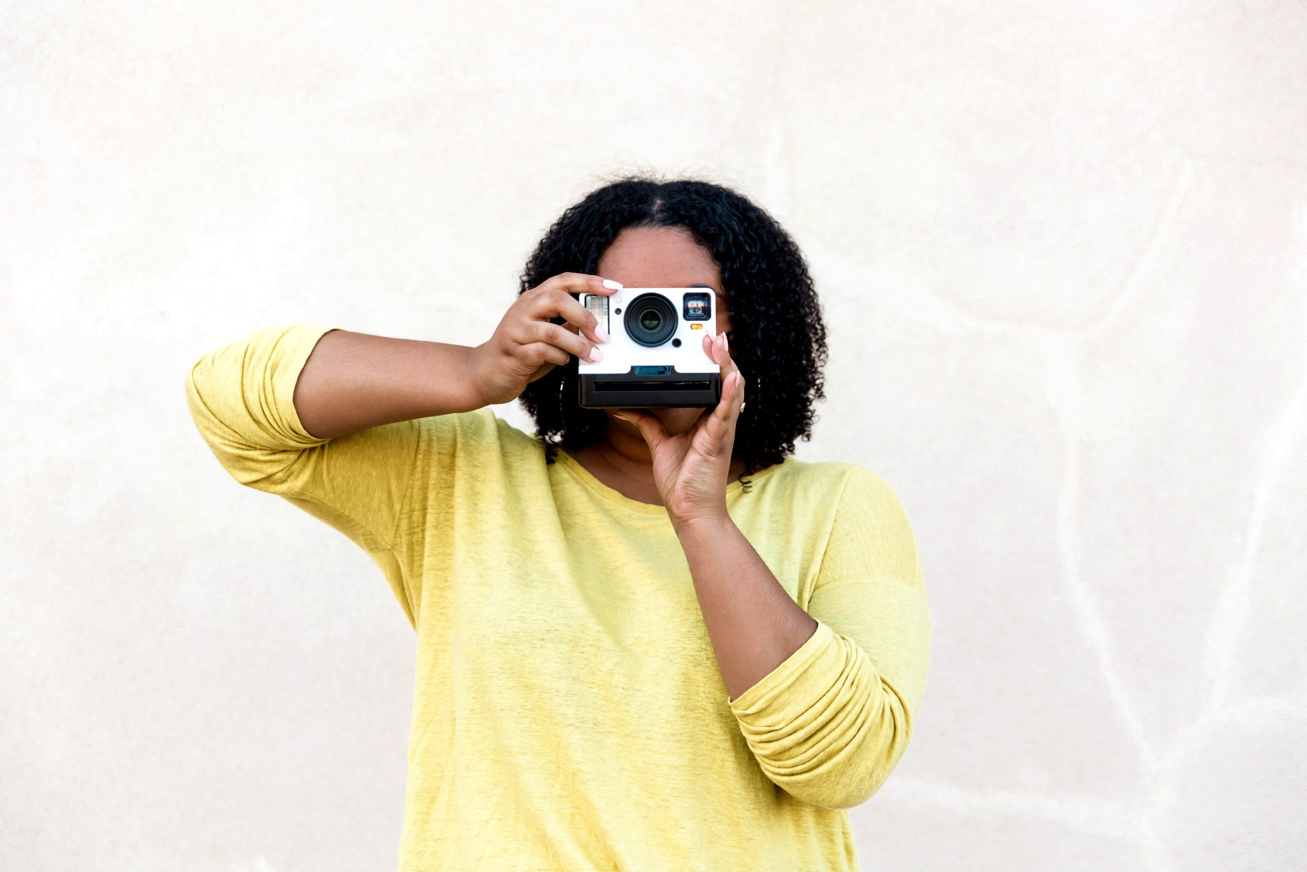 Person holding a camera